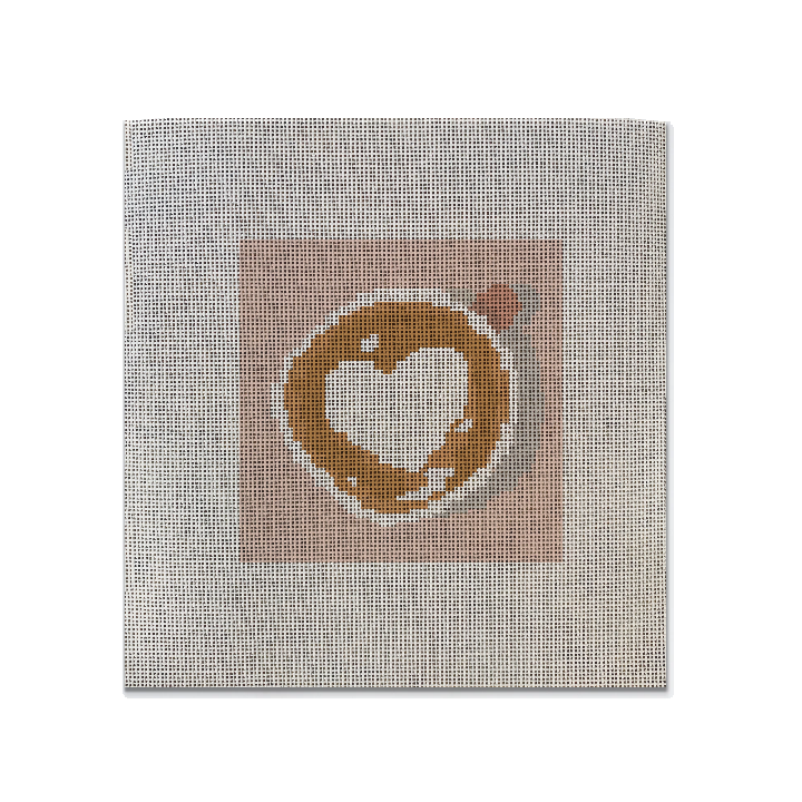 Needlepoint Canvas with a latte heart design on it