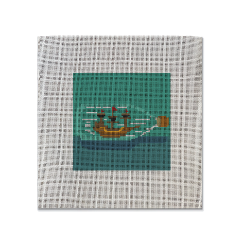 Needlepoint Canvas with a nautical theme ship in a bottle design on it