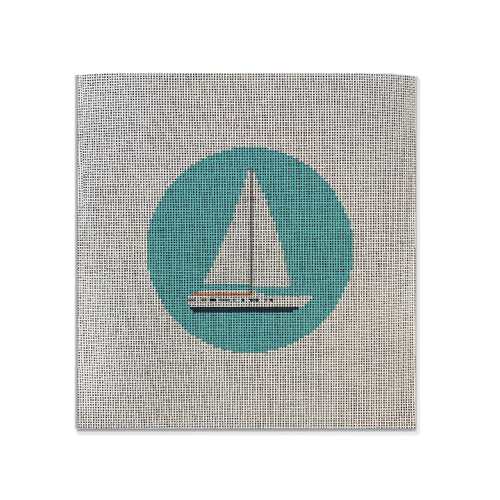 A needlepoint canvas with a classic sailboat and simple design on it